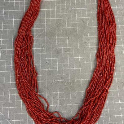 Sale Photo Thumbnail #160: 32" Long. With Silver Clasp. Has about 28 strands on it. THIS IS A NICE WEARABLE PIECE!!!!! 