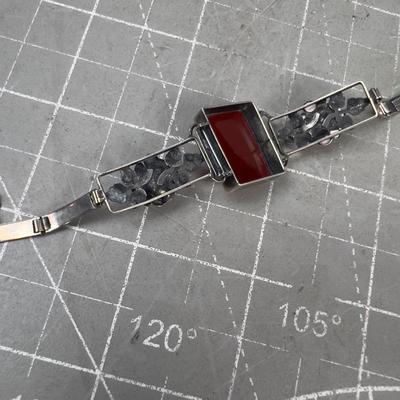 Sale Photo Thumbnail #310: 6" Long. Very Interesting. Wearable. Has a Rust Color Cut Stone. Like Carnelian 