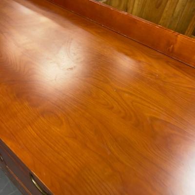 Sale Photo Thumbnail #447: Hotel grade commercial furniture. Has a little backslash included. Formica Top. Cherry Finish.  Measures 52 x 25 x 35" Tall Has a Few chips and a little dinged up. Bring Help! 