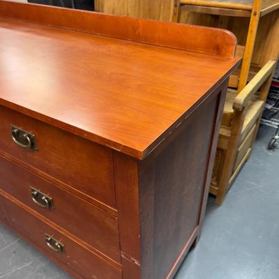 Sale Photo Thumbnail #446: Hotel grade commercial furniture. Has a little backslash included. Formica Top. Cherry Finish.  Measures 52 x 25 x 35" Tall Has a Few chips and a little dinged up. Bring Help! 