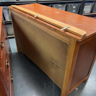 Sale Photo Thumbnail #455: Hotel grade commercial furniture. Came from Snowbird. Has a little backslash included. Formica Top. Cherry Finish.  Measures 52 x 25 x 35" Tall Has a Few chips and a little dinged up. Bring Help! 