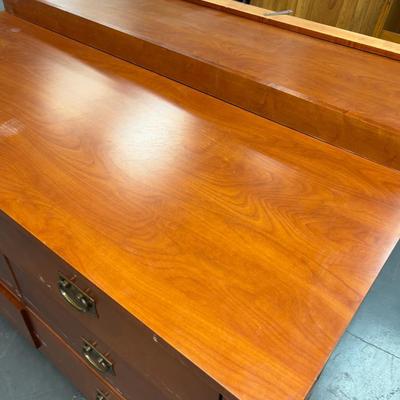 Sale Photo Thumbnail #452: Hotel grade commercial furniture. Came from Snowbird. Has a little backslash included. Formica Top. Cherry Finish.  Measures 52 x 25 x 35" Tall Has a Few chips and a little dinged up. Bring Help! 