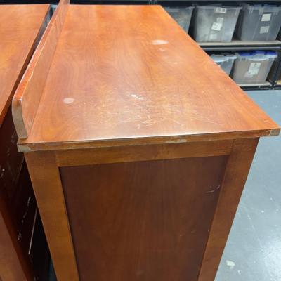 Sale Photo Thumbnail #454: Hotel grade commercial furniture. Came from Snowbird. Has a little backslash included. Formica Top. Cherry Finish.  Measures 52 x 25 x 35" Tall Has a Few chips and a little dinged up. Bring Help! 