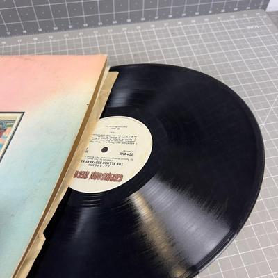 Sale Photo Thumbnail #1237: Cover is in worn Condition The Record is in good Condition. 