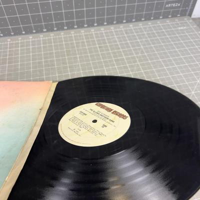 Sale Photo Thumbnail #1235: Cover is in worn Condition The Record is in good Condition. 