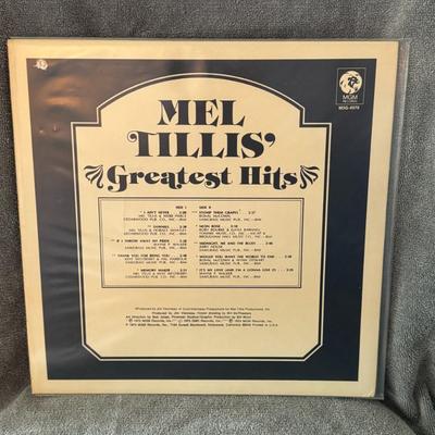 Sale Photo Thumbnail #269: Mel Tillis' Greatest Hits. 
Details about this album include:
Artist: Mel Tillis, an American country music artist.
Release Information: The album, identified by MGM Records M3G-4970, was released in 1974.
Contents: This compilation includes popular hits 