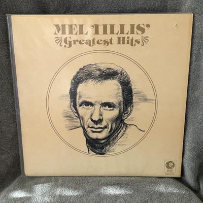 Sale Photo Thumbnail #268: Mel Tillis' Greatest Hits. 
Details about this album include:
Artist: Mel Tillis, an American country music artist.
Release Information: The album, identified by MGM Records M3G-4970, was released in 1974.
Contents: This compilation includes popular hits 