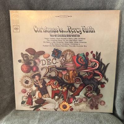 Sale Photo Thumbnail #316: "Christmas Is... Percy Faith His Orchestra and Chorus". 
Here is information about this Christmas album:
Artist: Percy Faith, His Orchestra and Chorus.
Album Title: Christmas Is....
Original Release: 1966 on Columbia Records (catalog number CS 9377).
Styl