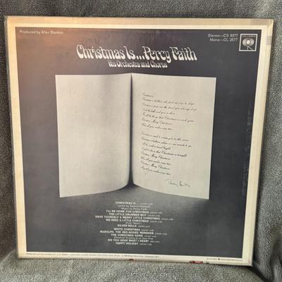 Sale Photo Thumbnail #317: "Christmas Is... Percy Faith His Orchestra and Chorus". 
Here is information about this Christmas album:
Artist: Percy Faith, His Orchestra and Chorus.
Album Title: Christmas Is....
Original Release: 1966 on Columbia Records (catalog number CS 9377).
Styl