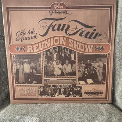 Sale Photo Thumbnail #230: The image you sent features the vinyl LP cover for "CMA Presents The 4th Annual Fan Fair Reunion Show," recorded live at the 1975 Fan Fair in Nashville, Tennessee. 
Here's more about this vintage record:
Historic Event: This album captures live performanc