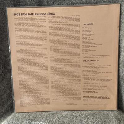 Sale Photo Thumbnail #231: The image you sent features the vinyl LP cover for "CMA Presents The 4th Annual Fan Fair Reunion Show," recorded live at the 1975 Fan Fair in Nashville, Tennessee. 
Here's more about this vintage record:
Historic Event: This album captures live performanc