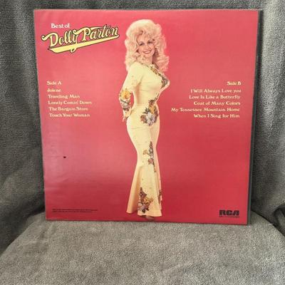 Sale Photo Thumbnail #240: "Best of Dolly Parton" on vinyl, first released in 1975 by RCA Victor. 
Key details about this album:
The album includes a selection of Dolly Parton's popular recordings from the early 1970s, including songs such as "Jolene" and "I Will Always Love You".

