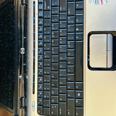 HP PAVILLION Dv2700 LAPTOP COMPUTER WITH WINDOWS VISTA HOME PREMIUM AND CARRY CASE