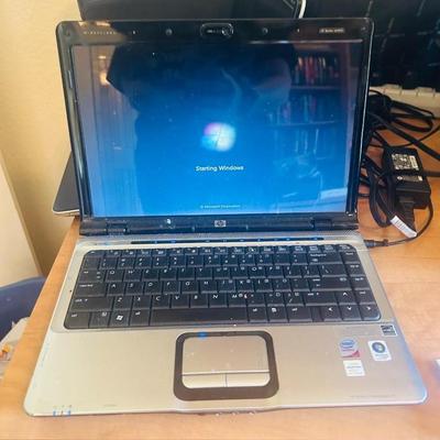 HP PAVILLION Dv2700 LAPTOP COMPUTER WITH WINDOWS VISTA HOME PREMIUM AND CARRY CASE
