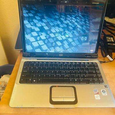 HP PAVILLION Dv2700 LAPTOP COMPUTER WITH WINDOWS VISTA HOME PREMIUM AND CARRY CASE