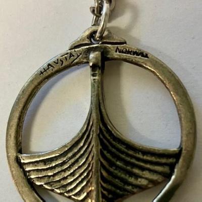 Sale Photo Thumbnail #185: Pendant with chain is by Havstad Tinn-measures 1 1/2 inches in diameter, chain is 25 inches.
The other pendant is by Elvind Hillstad- measures 2 inches in diameter.