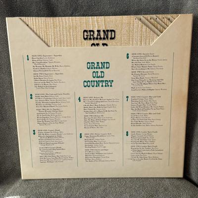 Sale Photo Thumbnail #357: "GRAND OLD COUNTRY" from Reader's Digest. 
Here are some details about this item:
Title: Grand Old Country.
Producer/Label: Reader's Digest in conjunction with Columbia Special Products.
Format: It is an 8-LP vinyl record box set.
Release Year: 1974.
Cont
