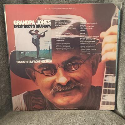 Sale Photo Thumbnail #359: "Grandpa Jones Sings Hits from "Hee Haw"", also known by its longer title, "Everybody's Grandpa Sings Hits From Hee Haw". 
Here's more about this album:
Artist: Grandpa Jones (Louis Marshall Jones), a prominent American country and bluegrass musician and 
