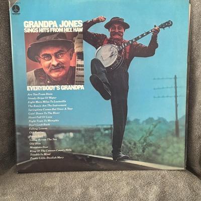 Sale Photo Thumbnail #358: "Grandpa Jones Sings Hits from "Hee Haw"", also known by its longer title, "Everybody's Grandpa Sings Hits From Hee Haw". 
Here's more about this album:
Artist: Grandpa Jones (Louis Marshall Jones), a prominent American country and bluegrass musician and 