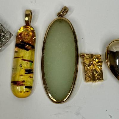 Pendant Lot #1 - misc Pendants in amber, jade, gold tone, etc