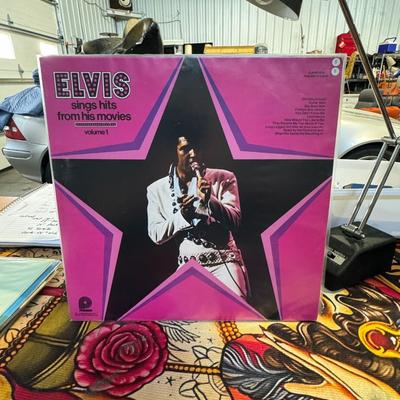 Sale Photo Thumbnail #127: Elvis Sings Hits from His Movies, Volume 1 by Elvis Presley. 
Here's some information about this album:
Release and Content: This compilation album features tracks from four of Elvis Presley's movies, as well as two non-movie tracks. It was first released
