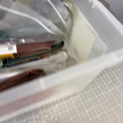 Tub full of Sanding Paper and Belts 