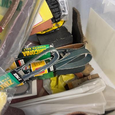 Tub full of Sanding Paper and Belts 
