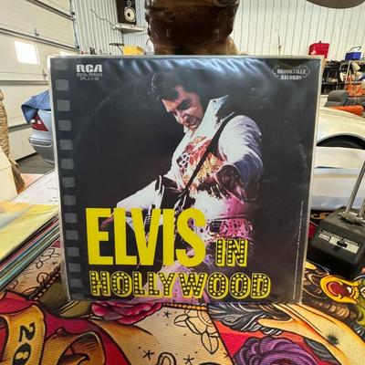 Sale Photo Thumbnail #67: Elvis in Hollywood double LP vinyl record album by Elvis Presley. 
Here's some information about this album:
Artist: Elvis Presley.
Title: Elvis in Hollywood.
Release Year: It was originally issued in January 1976.
Record Labels: RCA Special Products and 