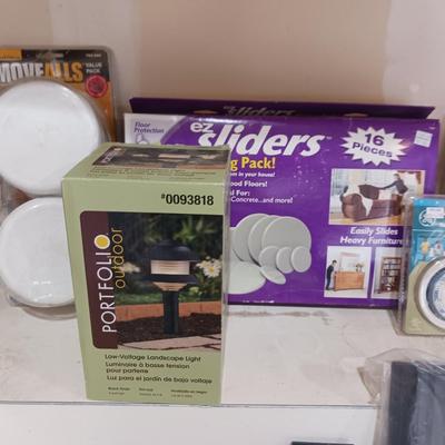 A VARIETY OF HOUSEHOLD ITEMS