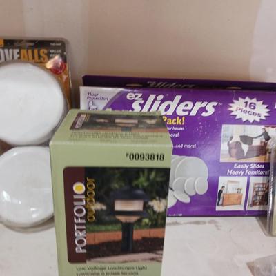 A VARIETY OF HOUSEHOLD ITEMS
