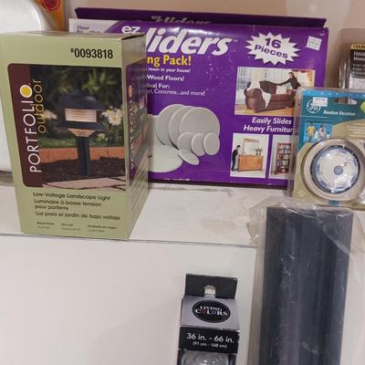 A VARIETY OF HOUSEHOLD ITEMS
