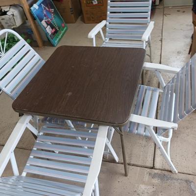 CARD TABLE W/ FOUR FOLDING CHAIRS