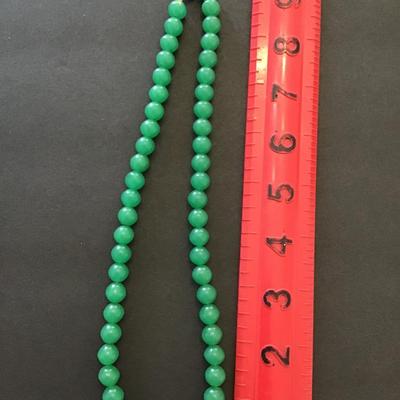 Sale Photo Thumbnail #34: Vintage green glass beaded necklace. Please see attached photos.