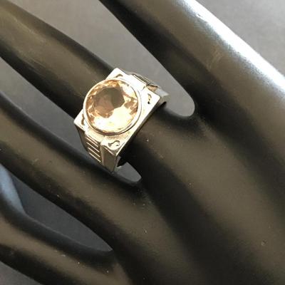 Sale Photo Thumbnail #81: Beautiful sterling, silver ring, light peach, colored rhinestones. Please see attached photos.