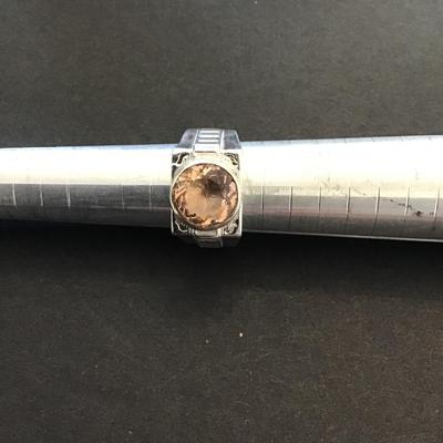 Sale Photo Thumbnail #83: Beautiful sterling, silver ring, light peach, colored rhinestones. Please see attached photos.