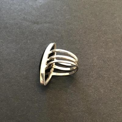 Sale Photo Thumbnail #102: Beautiful silver ring with black glass rhinestone. Please see attached photos.