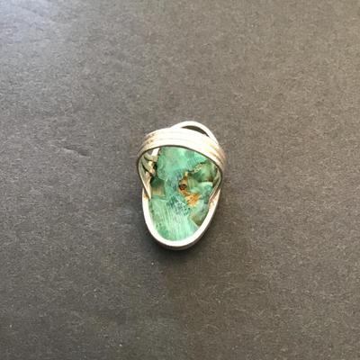 Sale Photo Thumbnail #152: Beautiful silver 925 ring with polished Earthstone. Please see attached photos.