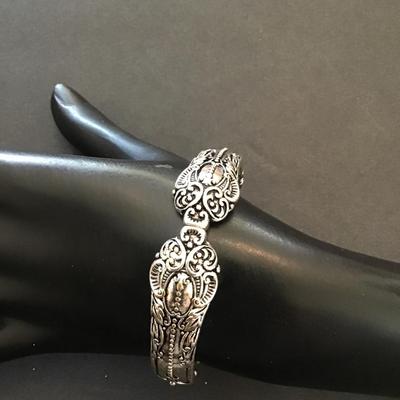 Sale Photo Thumbnail #218: SilverTone stretchy fashion bracelet. Please see attached photos.