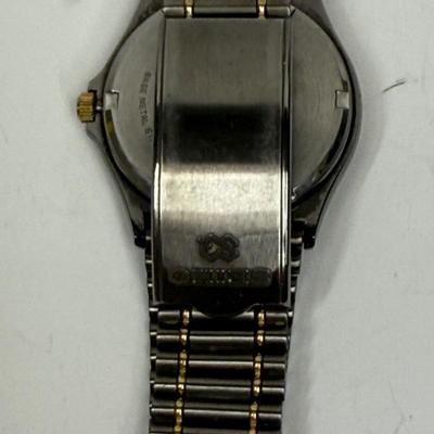 Vintage Seiko Men's Quartz QS 100 Watch 8123-6349 Black Steel Gold Date 10 Bar