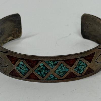 Sale Photo Thumbnail #498: Bracelet has markings inside that are faint and could not be identified, but the bracelet has the look and feel of a vintage silver bracelet.
