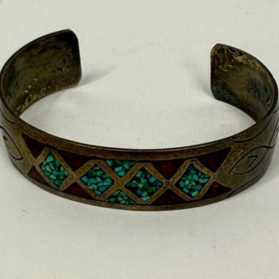 Sale Photo Thumbnail #502: Bracelet has markings inside that are faint and could not be identified, but the bracelet has the look and feel of a vintage silver bracelet.