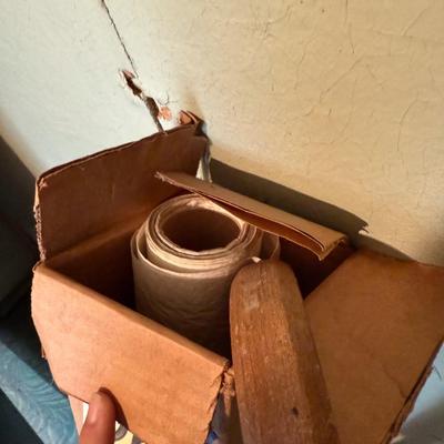 Sale Photo Thumbnail #434: Cane, yardsticks, large roll of table cover