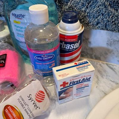 Sale Photo Thumbnail #459: Bandaids, mouth wash, pill container, etc.