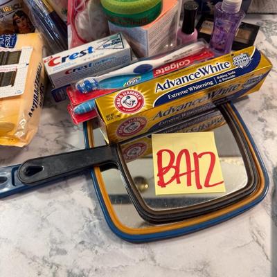Sale Photo Thumbnail #463: Brush rollers, handheld mirror, toothpaste, bobby pins, hair care, etc.