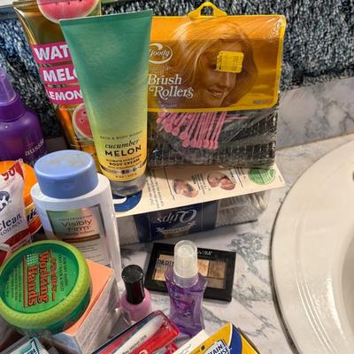 Sale Photo Thumbnail #464: Brush rollers, handheld mirror, toothpaste, bobby pins, hair care, etc.