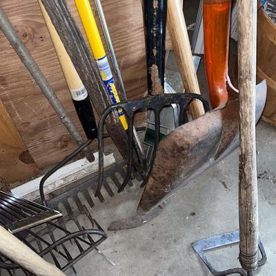 Sale Photo Thumbnail #496: Rake, pitchfork, several shovels, squeegee, etc.