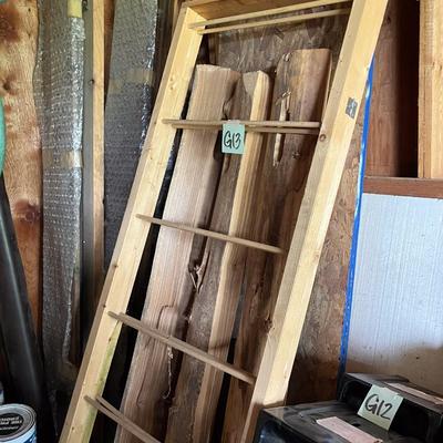 Sale Photo Thumbnail #505: Wood piece with rungs, large wood planks/boards behind it