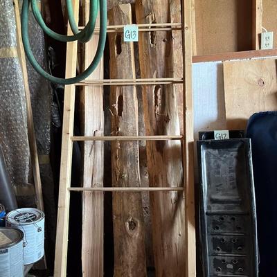 Sale Photo Thumbnail #506: Wood piece with rungs, large wood planks/boards behind it