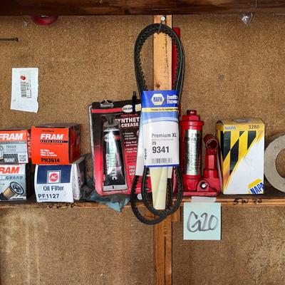 Sale Photo Thumbnail #521: Oil filters, belts, hydraulic jack, etc.