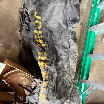 Sale Photo Thumbnail #560: John Deere cover (not sure exactly for what), carpet adhesive, etc.